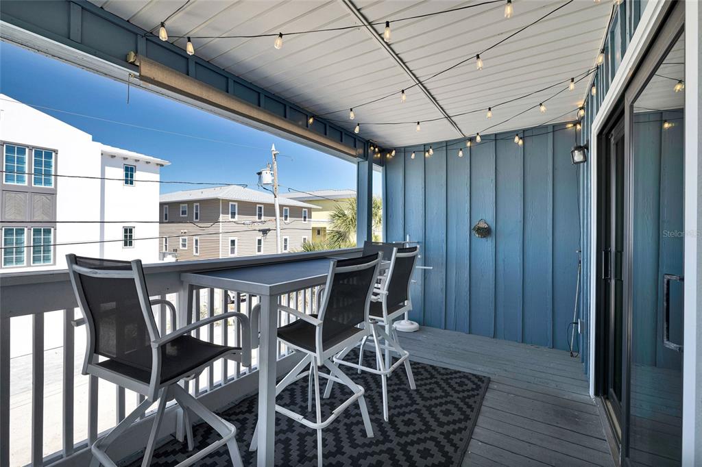 812 Gulf Boulevard, Unit 3 Indian Rocks Beach, FL 33785 - Photo 33 of 62 a view of a dining room with furniture and window