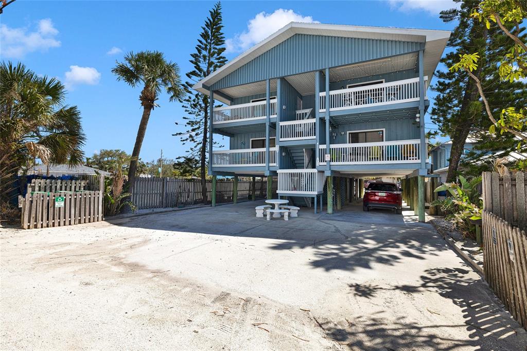 812 Gulf Boulevard, Unit 3 Indian Rocks Beach, FL 33785 - Photo 41 of 62 a view of a house with a patio