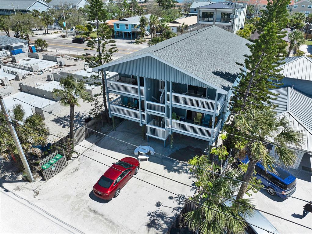812 Gulf Boulevard, Unit 3 Indian Rocks Beach, FL 33785 - Photo 45 of 62 an aerial view of a house with a yard