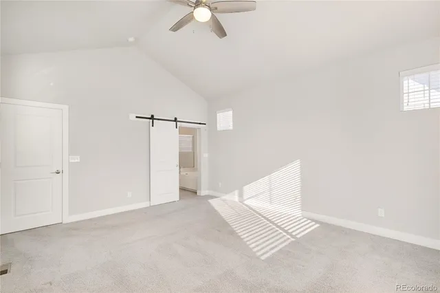 a view of a bathroom with a sink and a mirror