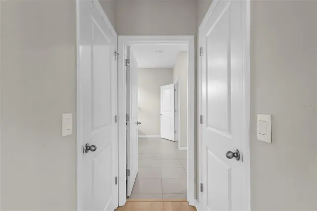 a view of a bathroom from a hallway