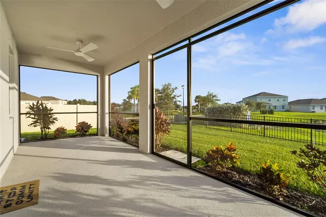 a view of a house with a garden and balcony