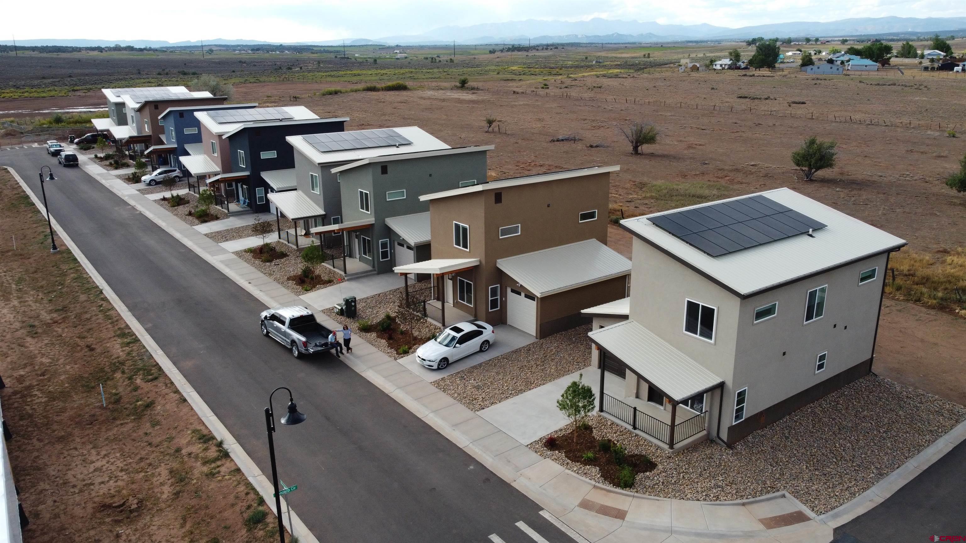 170 Manzano Circle Ignacio, CO 81137 - Photo 3 of 11 an aerial view of a house with roof deck