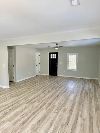a view of an empty room and window