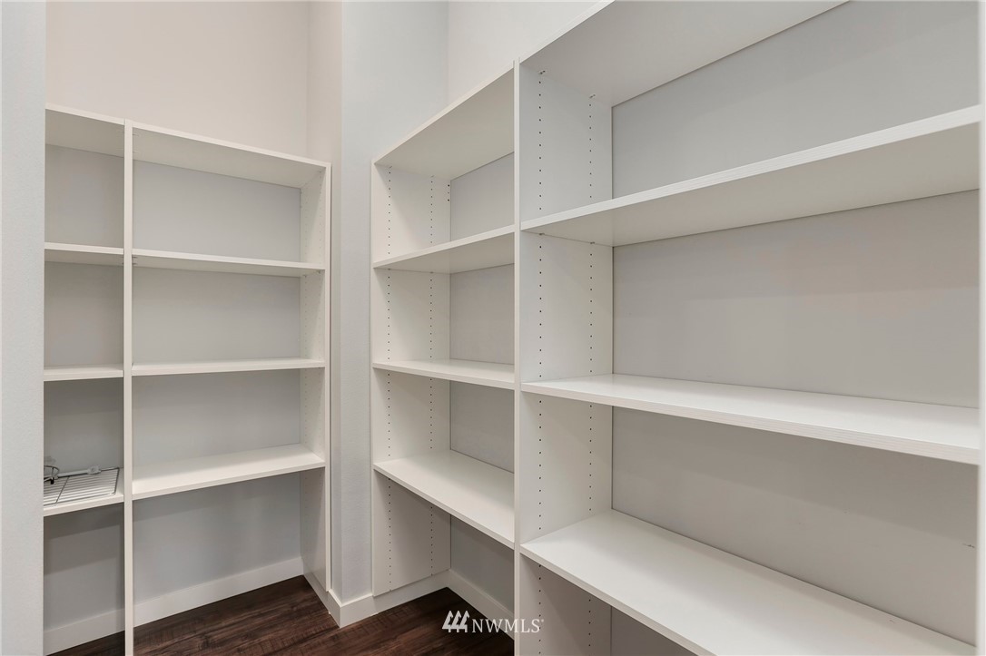 22720 41st Drive Southeast Bothell, WA 98021 - Photo 11 of 33 a view of walk in closet with empty racks