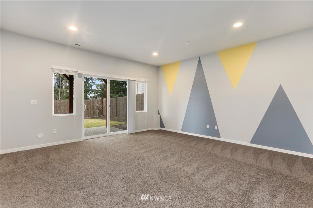 22720 41st Drive Southeast Bothell, WA 98021 - Photo 13 of 33 an empty room with windows