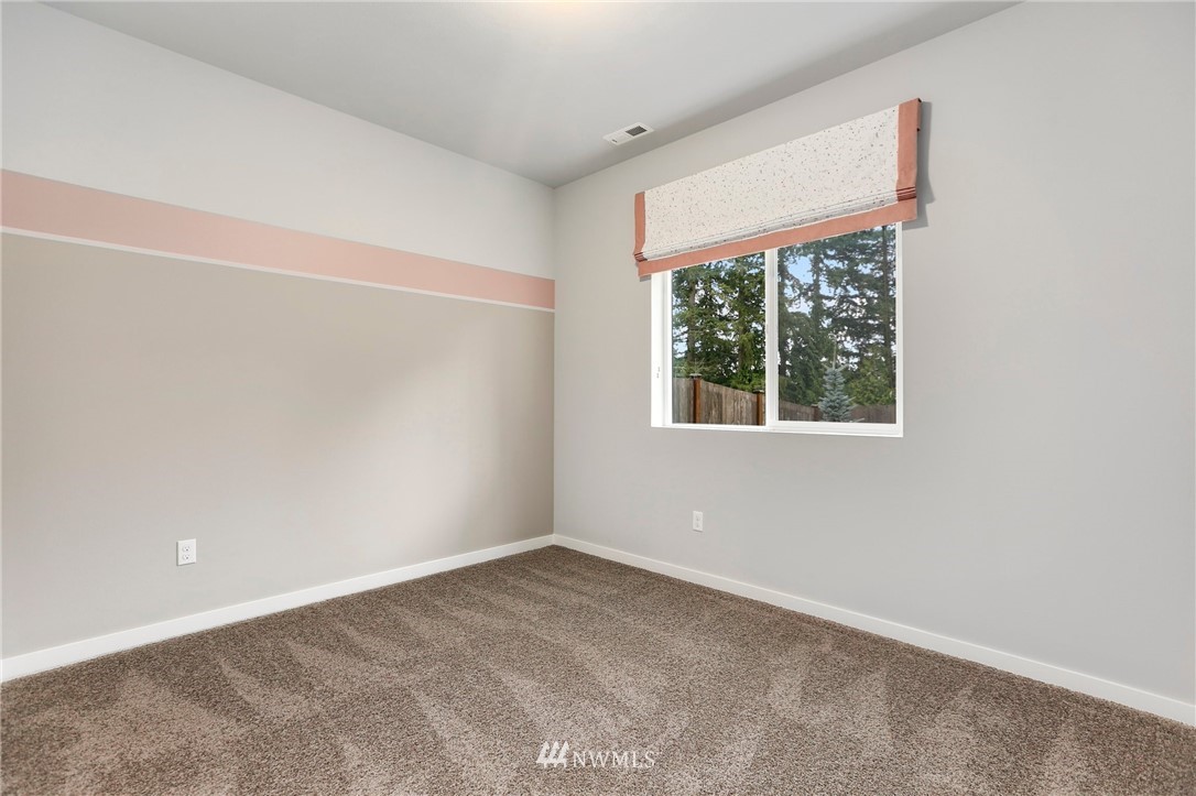 22720 41st Drive Southeast Bothell, WA 98021 - Photo 14 of 33 an empty room with a window