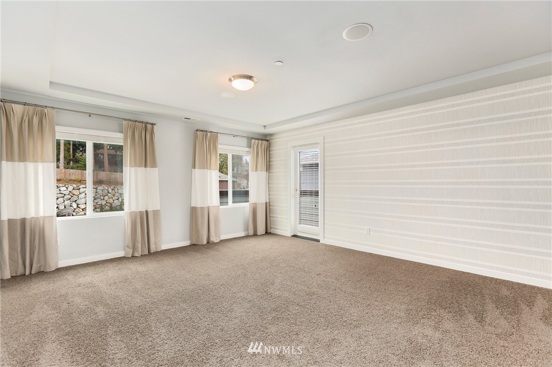 22720 41st Drive Southeast Bothell, WA 98021 - Photo 17 of 33 an empty room with windows
