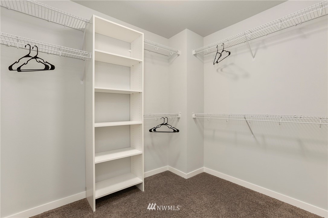 22720 41st Drive Southeast Bothell, WA 98021 - Photo 20 of 33 a view of walk in closet with empty racks