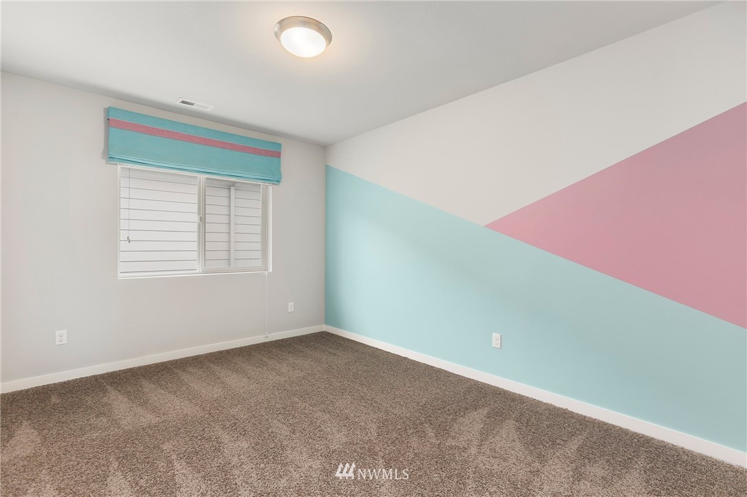 22720 41st Drive Southeast Bothell, WA 98021 - Photo 24 of 33 an empty room with windows