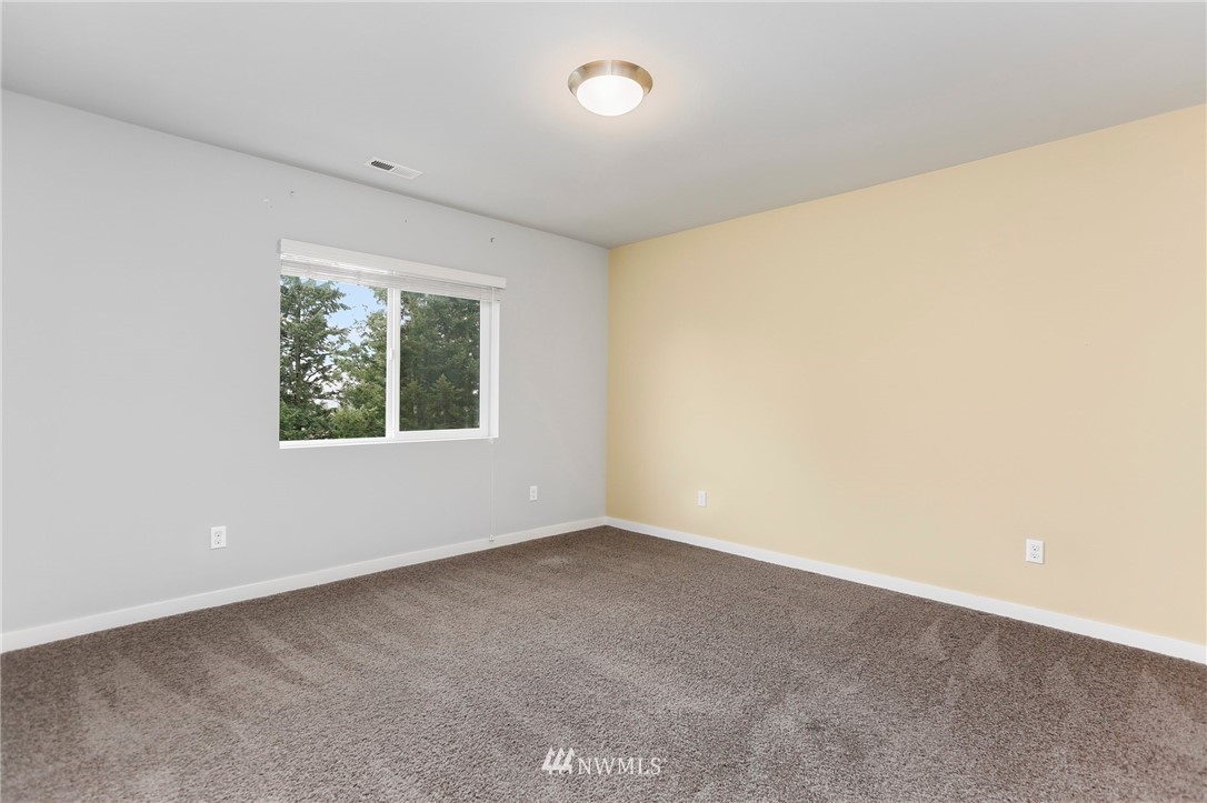 22720 41st Drive Southeast Bothell, WA 98021 - Photo 25 of 33 an empty room with a window