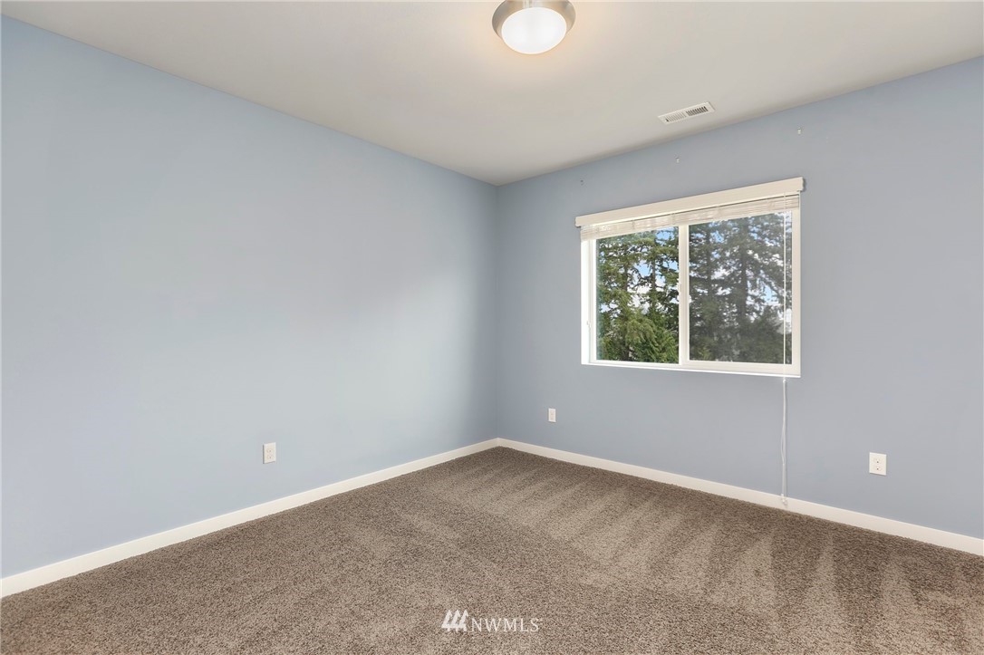 22720 41st Drive Southeast Bothell, WA 98021 - Photo 27 of 33 an empty room with a window