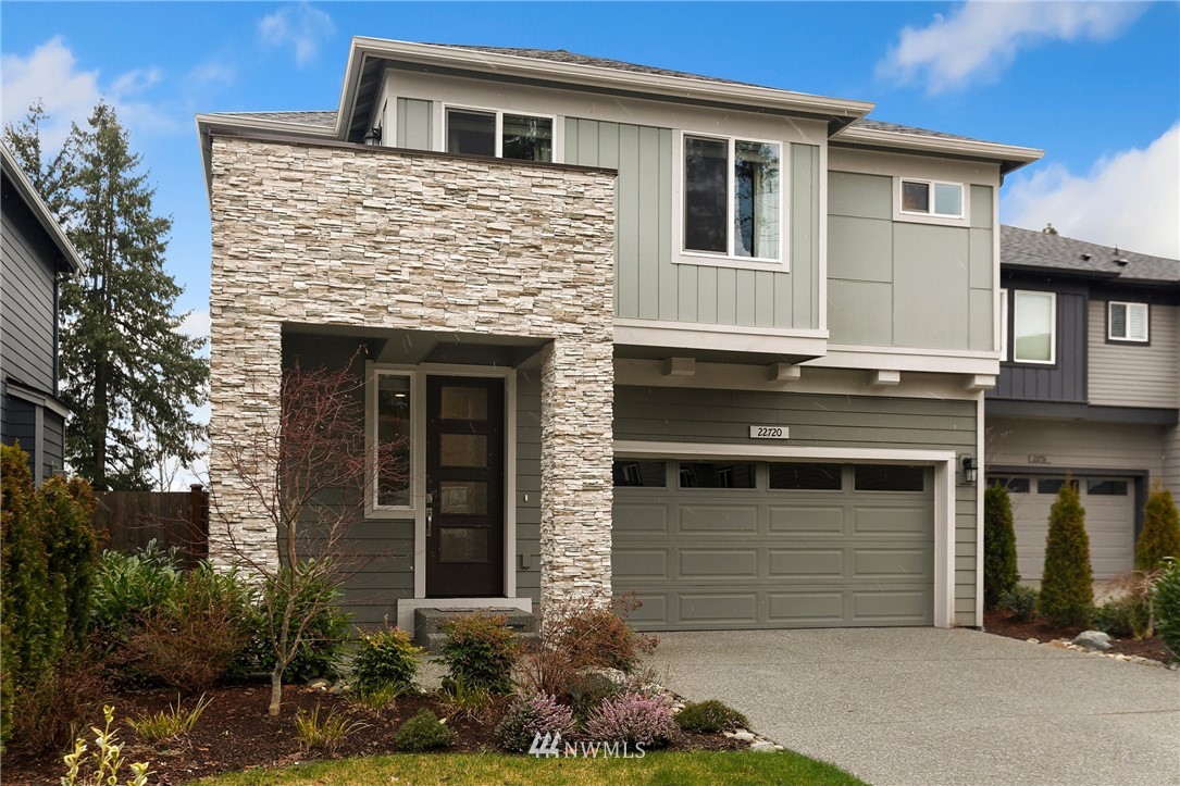 22720 41st Drive Southeast Bothell, WA 98021 - Photo 33 of 33 a front view of a house with a yard