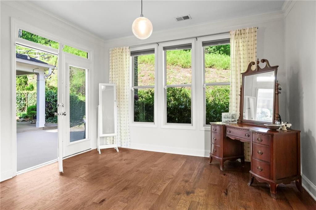 183 Lullwater Lane Dallas, GA 30132 - Photo 20 of 40 a view of an empty room with wooden floor and a window