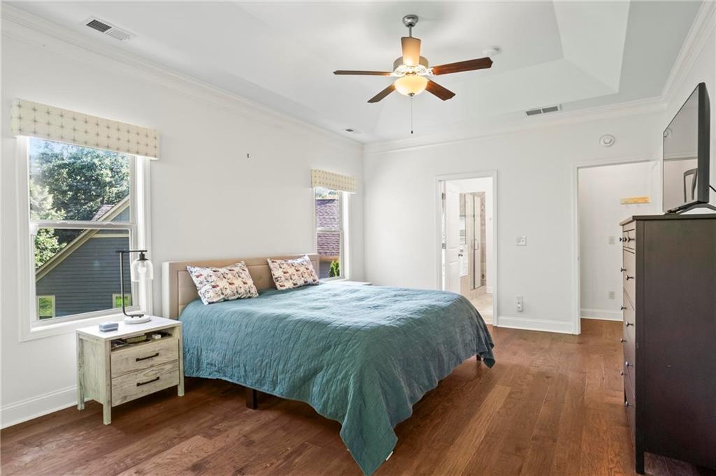 183 Lullwater Lane Dallas, GA 30132 - Photo 21 of 40 a bedroom with a bed and a large window