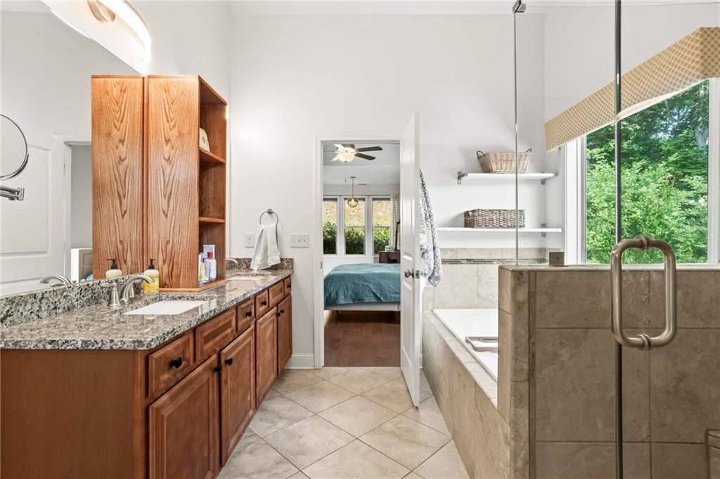 183 Lullwater Lane Dallas, GA 30132 - Photo 24 of 40 a kitchen with stainless steel appliances granite countertop a sink and a refrigerator