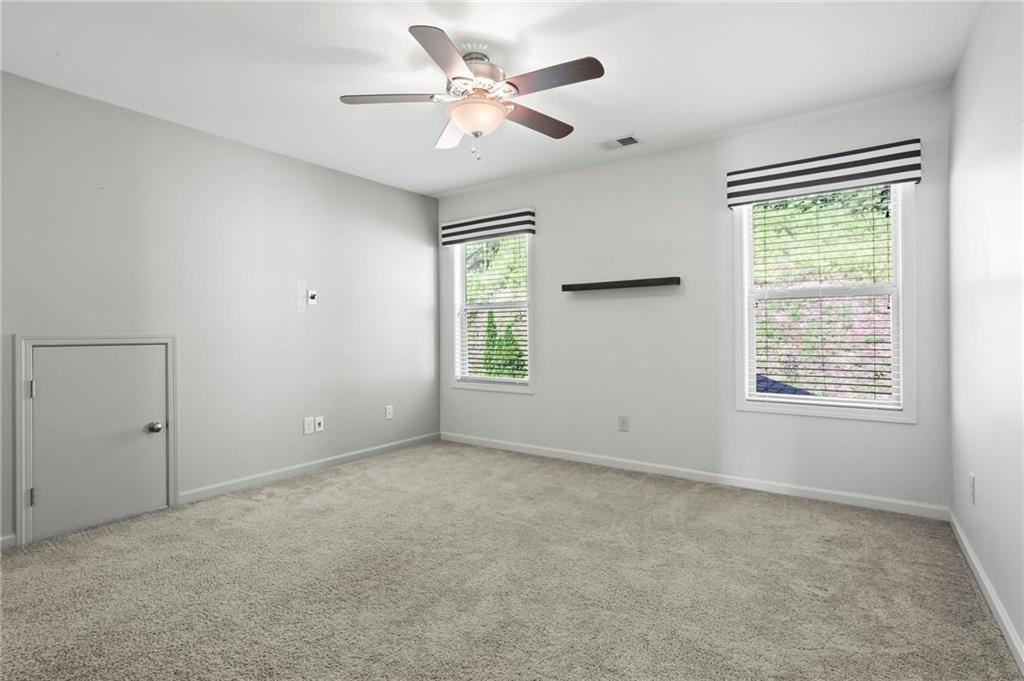 183 Lullwater Lane Dallas, GA 30132 - Photo 28 of 40 an empty room with windows and fan