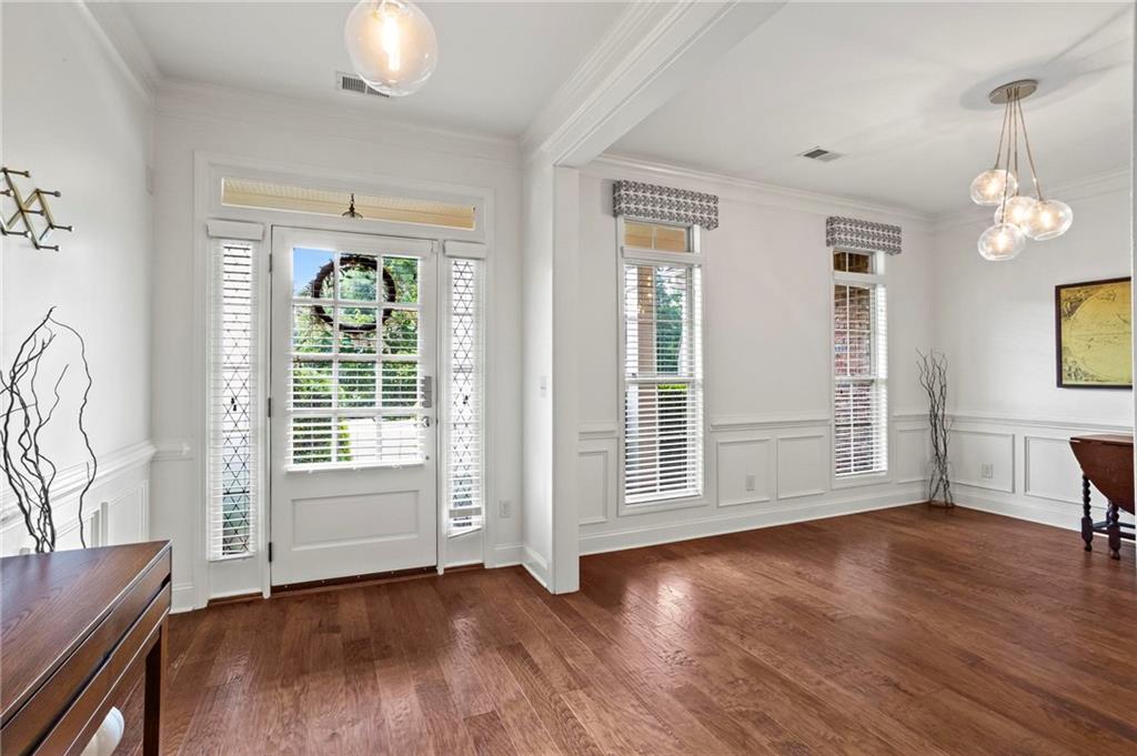 183 Lullwater Lane Dallas, GA 30132 - Photo 5 of 40 an empty room with wooden floor and windows
