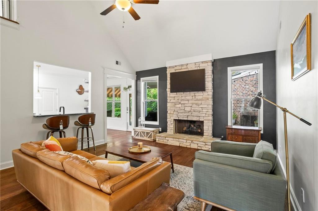 183 Lullwater Lane Dallas, GA 30132 - Photo 10 of 40 a living room with furniture fireplace and a large window