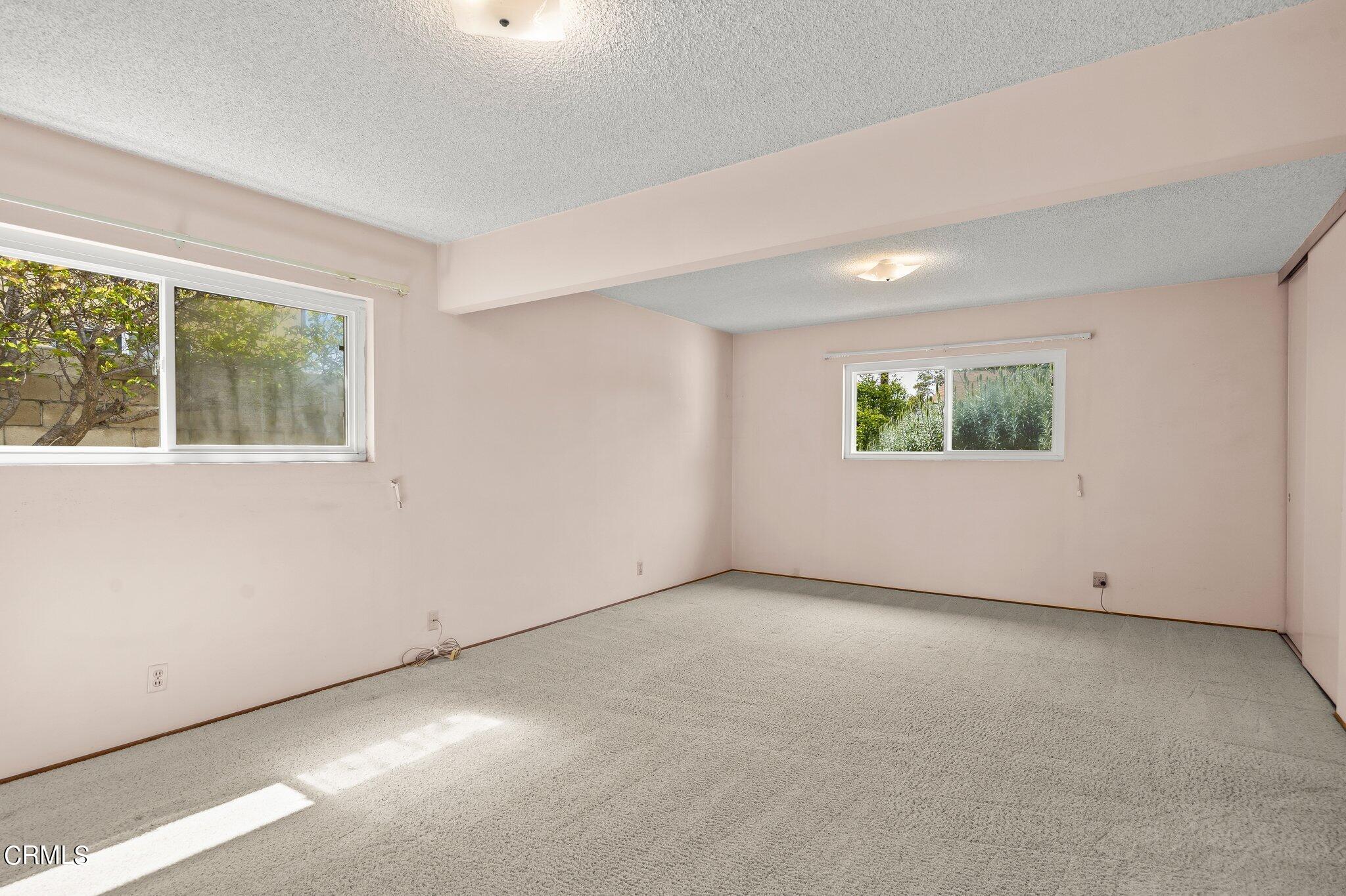 4989 Strickland Drive Oxnard, CA 93036 - Photo 15 of 26 an empty room with windows