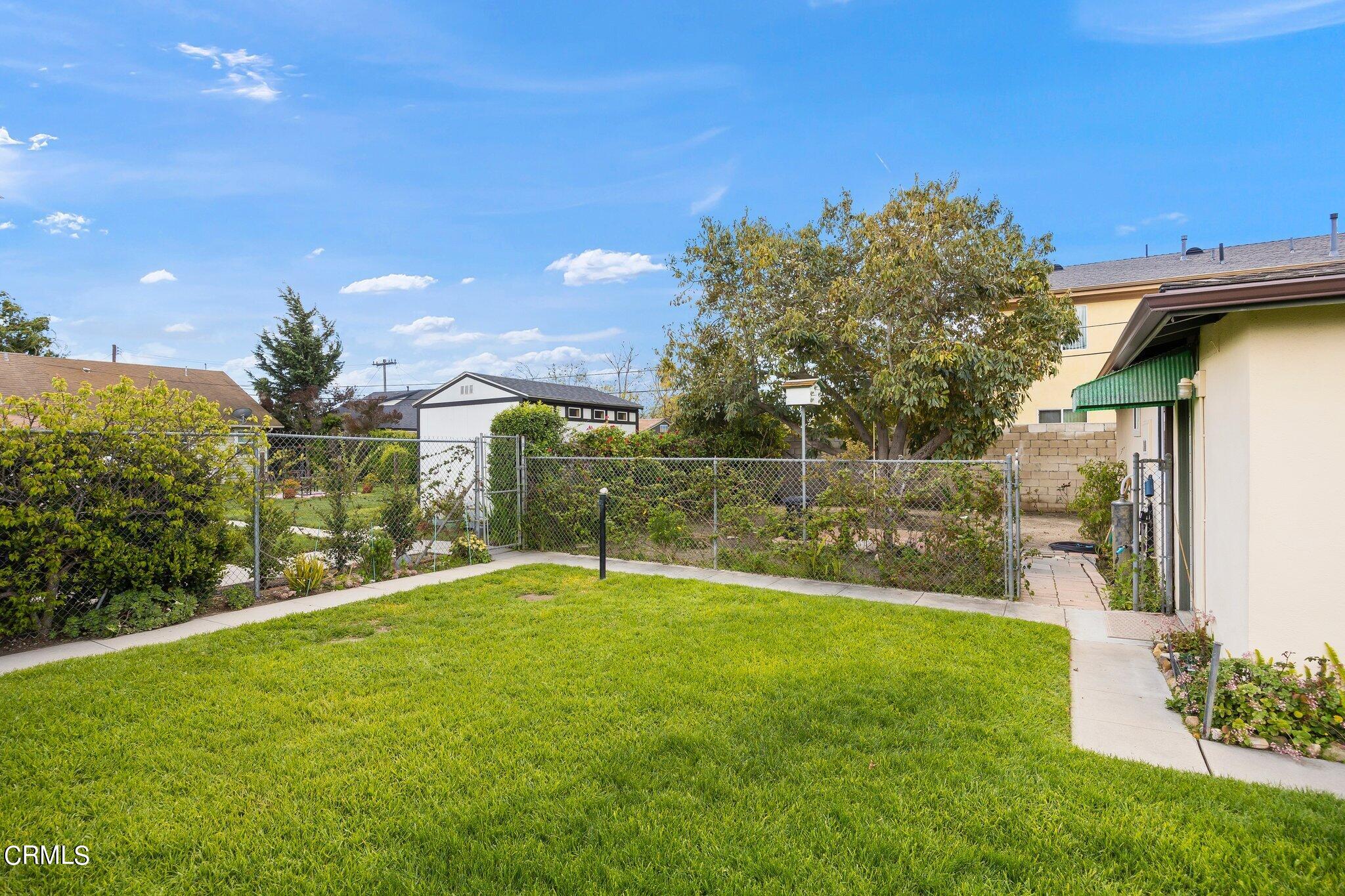 4989 Strickland Drive Oxnard, CA 93036 - Photo 20 of 26 a view of a back yard