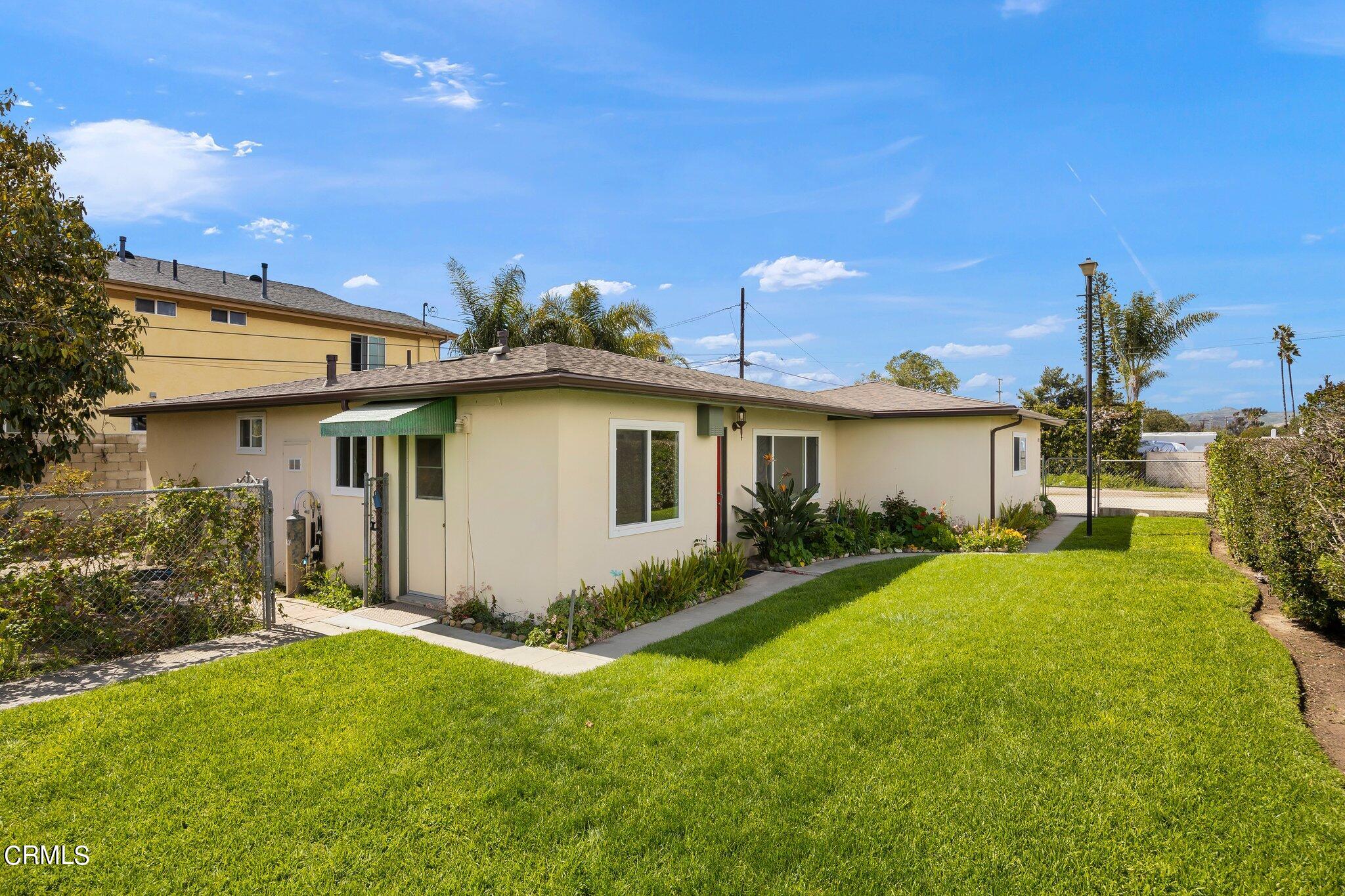 4989 Strickland Drive Oxnard, CA 93036 - Photo 4 of 26 a view of a house with backyard