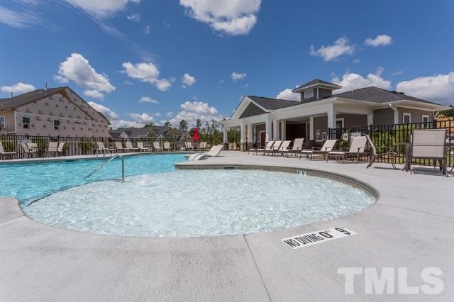 220 Zante Currant Road Durham, NC 27703 - Photo 23 of 24 a view of a house with a entertaining space