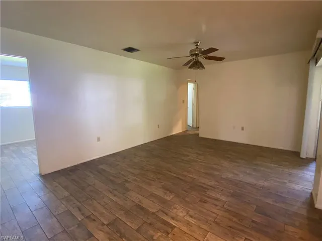 a kitchen with a sink cabinets and stainless steel appliances
