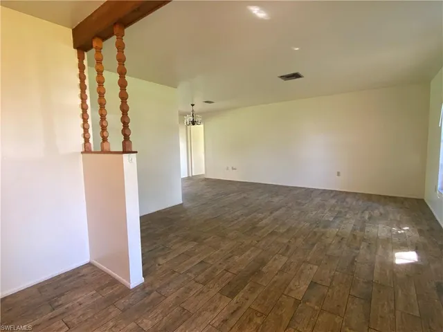 a view of a brick wall with a window