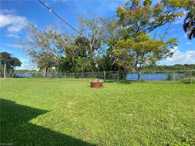 a view of garden with trees