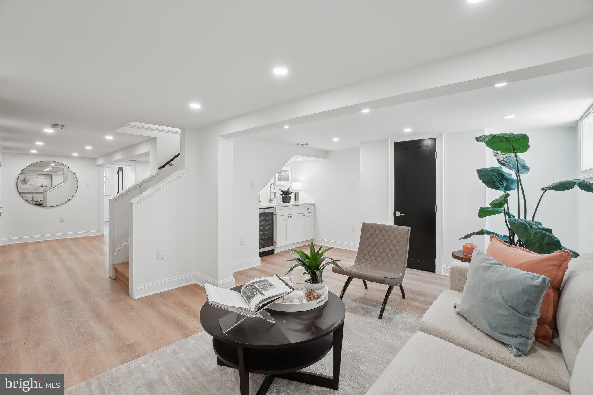 4423 Volta Place Northwest Washington, DC 20007 - Photo 23 of 36 a living room with furniture kitchen view and a table