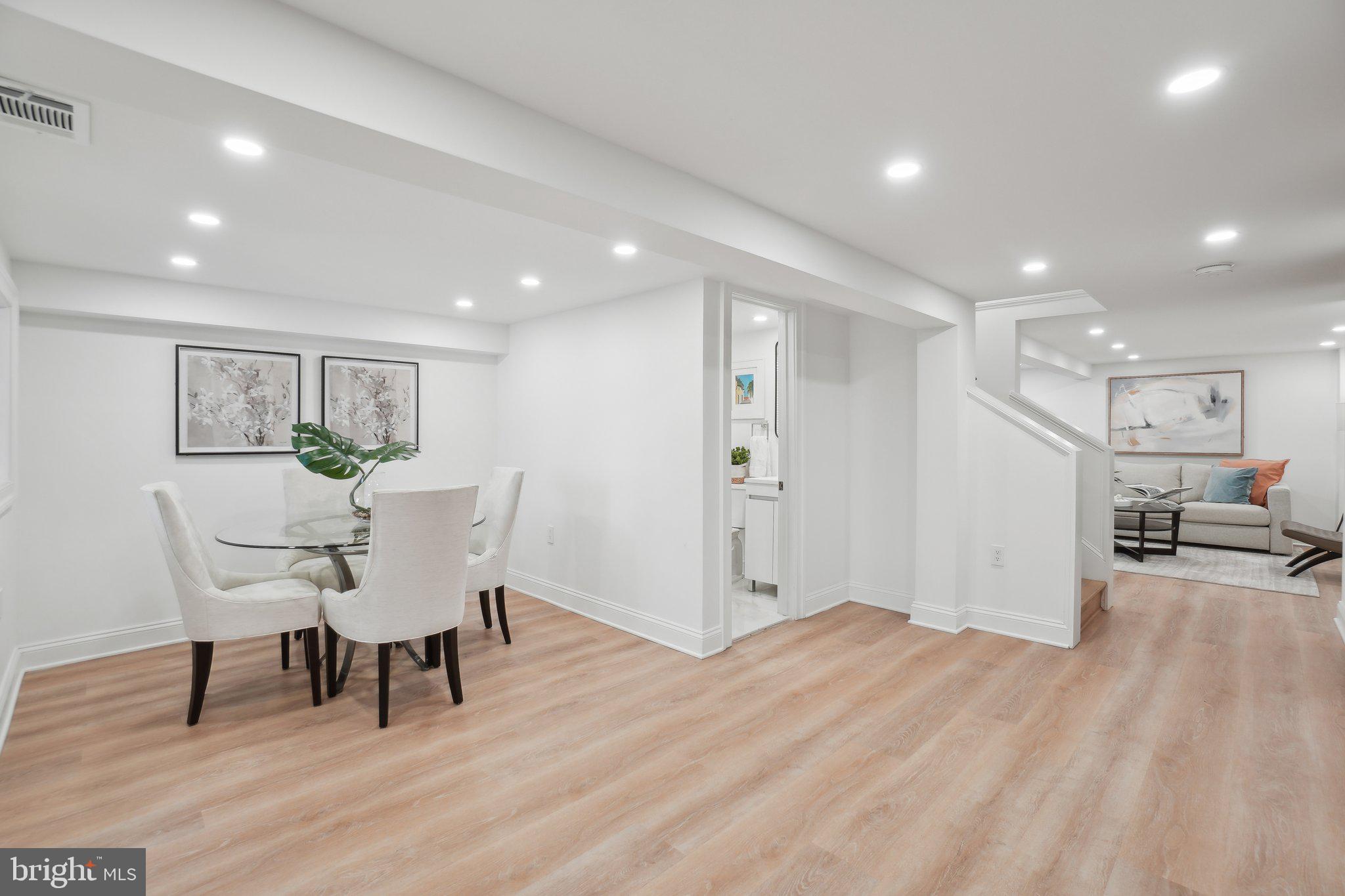 4423 Volta Place Northwest Washington, DC 20007 - Photo 26 of 36 a view of a dining room with furniture and wooden floor