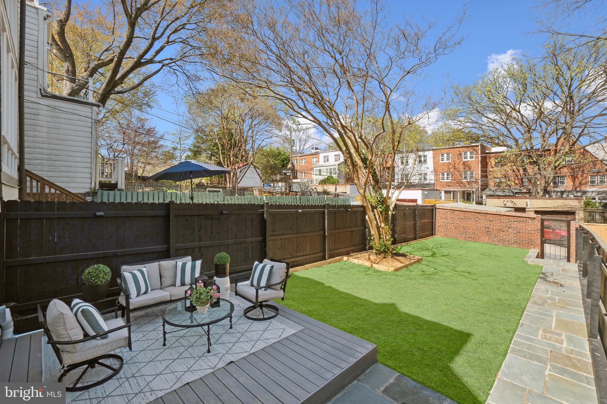 4423 Volta Place Northwest Washington, DC 20007 - Photo 29 of 36 a view of a backyard with sitting area