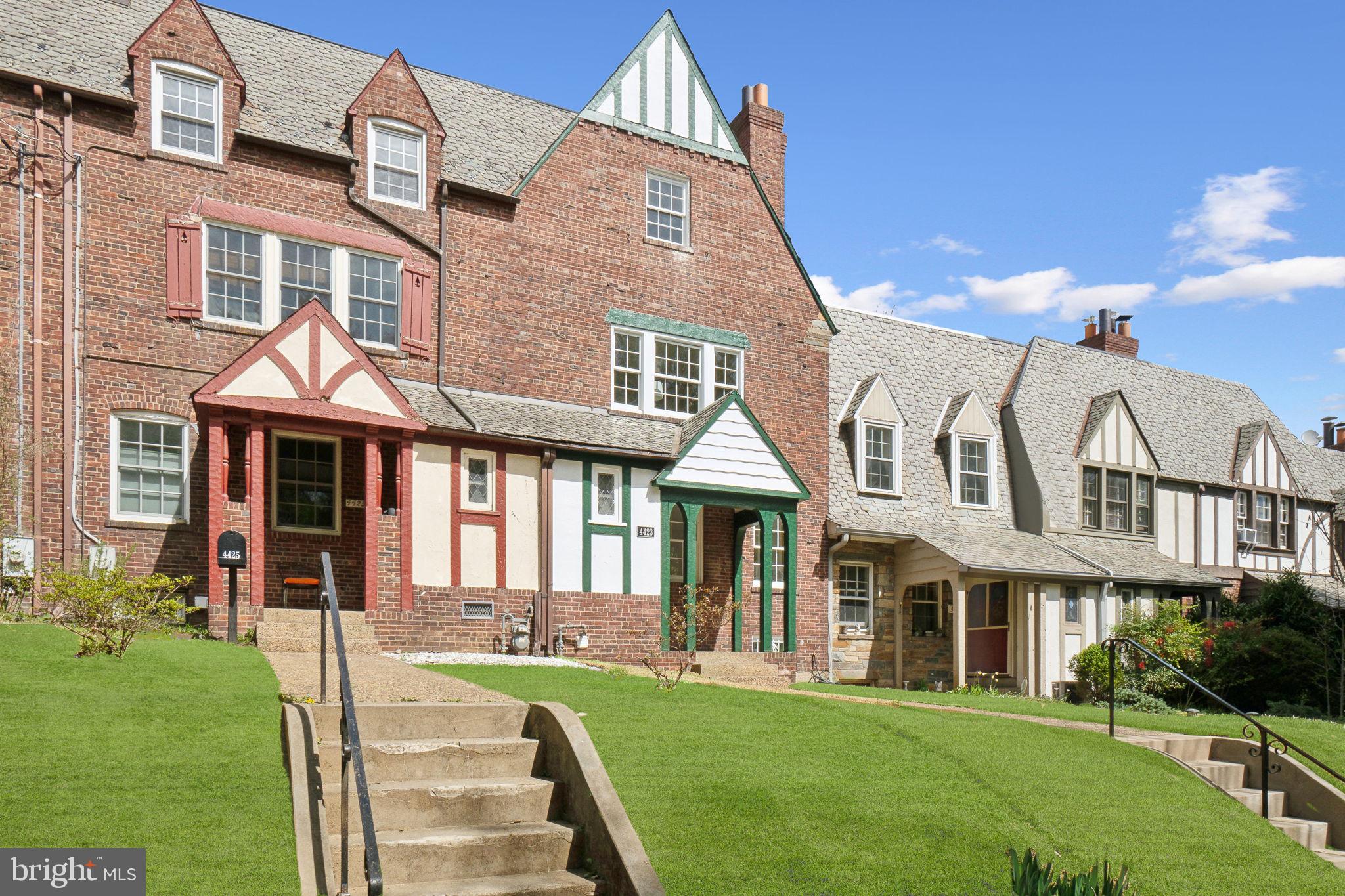 4423 Volta Place Northwest Washington, DC 20007 - Photo 33 of 36 a front view of a house with a yard
