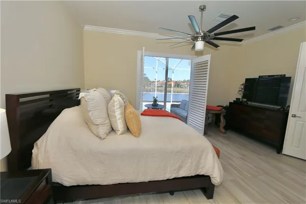 a large white bed in a small room