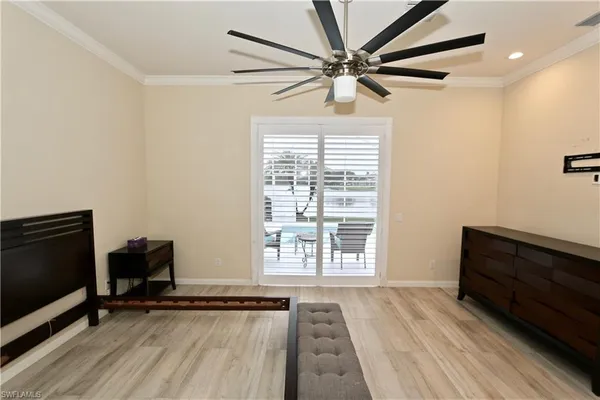 a bathroom with a shower a toilet and sink