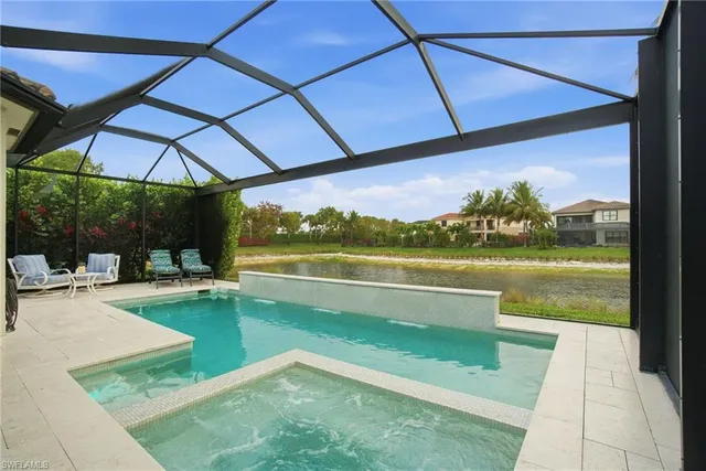 a view of a swimming pool with a patio