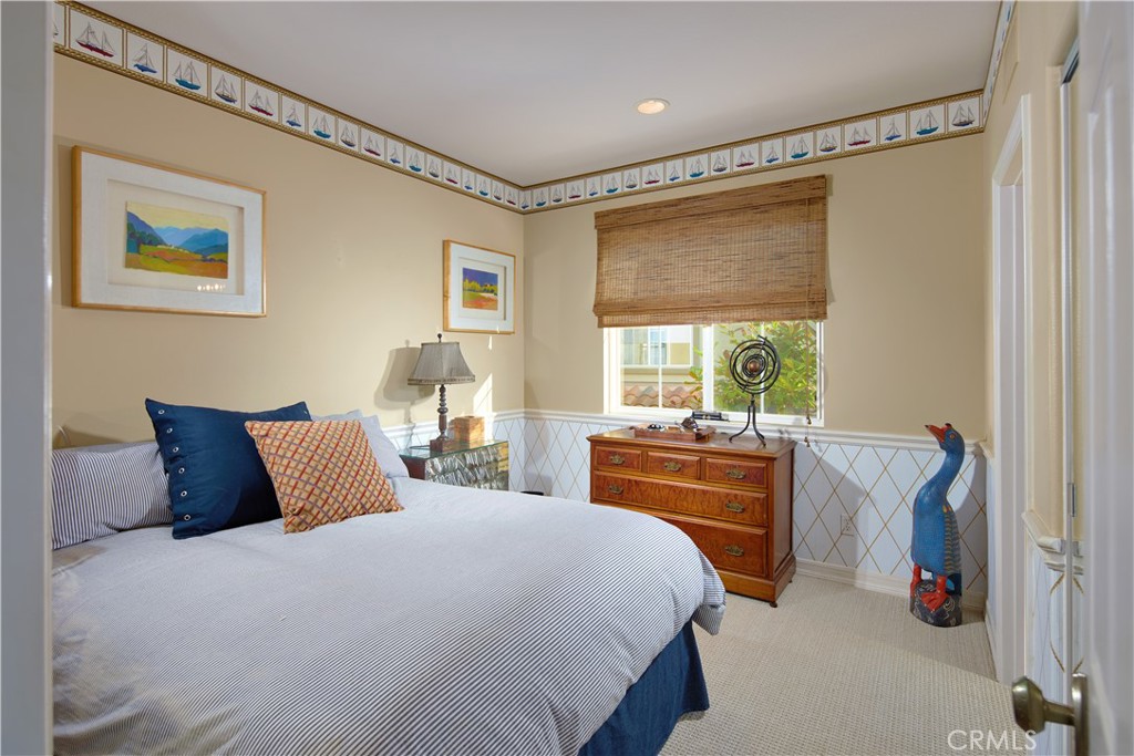 1432 Sea Ridge Drive Newport Beach, CA 92660 - Photo 21 of 25 a bedroom with a bed and a window
