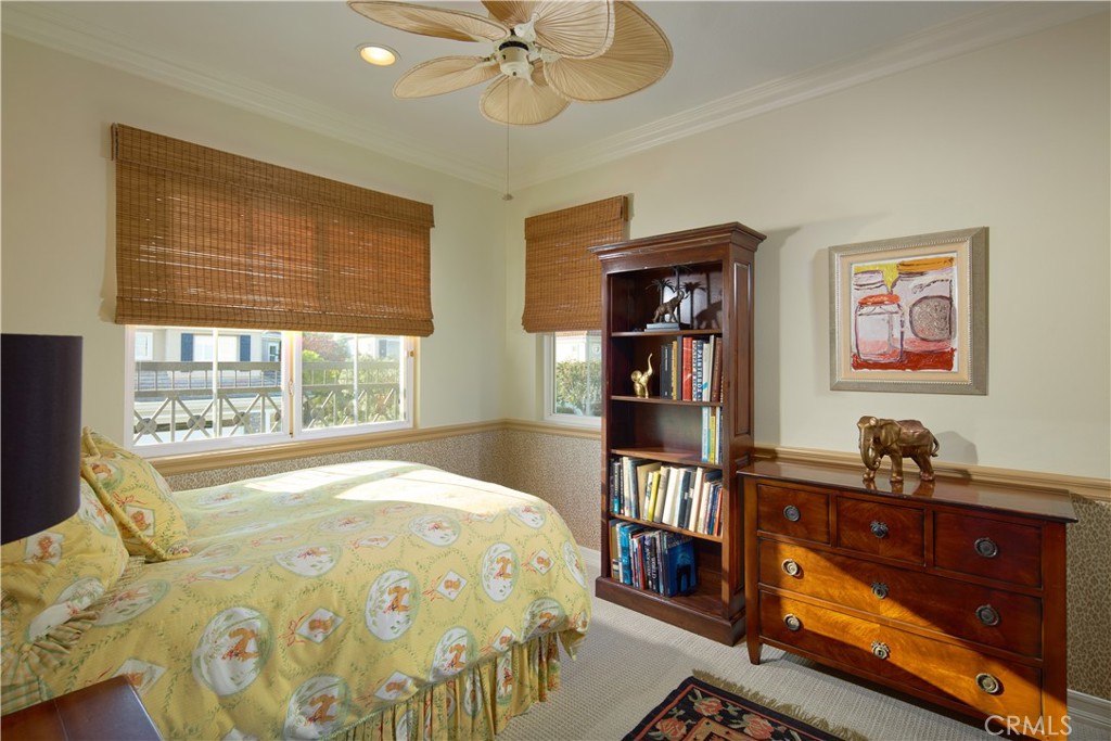 1432 Sea Ridge Drive Newport Beach, CA 92660 - Photo 23 of 25 a bedroom with a bed and wooden floor