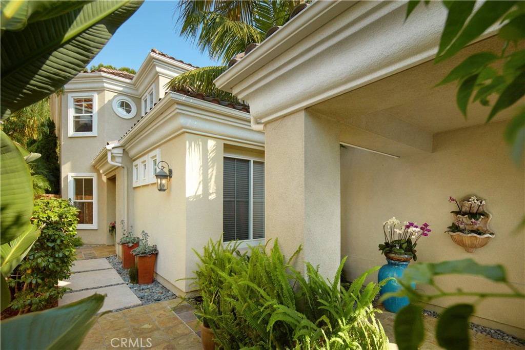 1432 Sea Ridge Drive Newport Beach, CA 92660 - Photo 3 of 25 a front view of a house with a yard