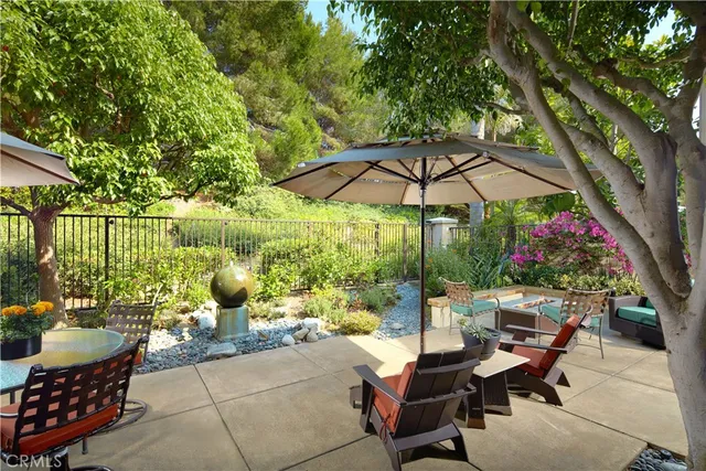 a patio with patio area and furniture