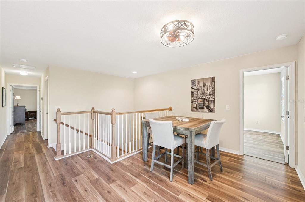 12680 Richezza Drive Venice, FL 34293 - Photo 16 of 57 a view of a dining room with furniture