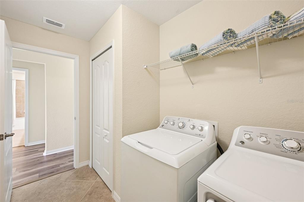 12680 Richezza Drive Venice, FL 34293 - Photo 31 of 57 a utility room with dryer and washer
