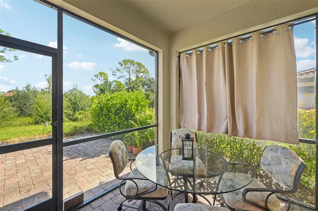 12680 Richezza Drive Venice, FL 34293 - Photo 32 of 57 a view of a room with furniture and a window