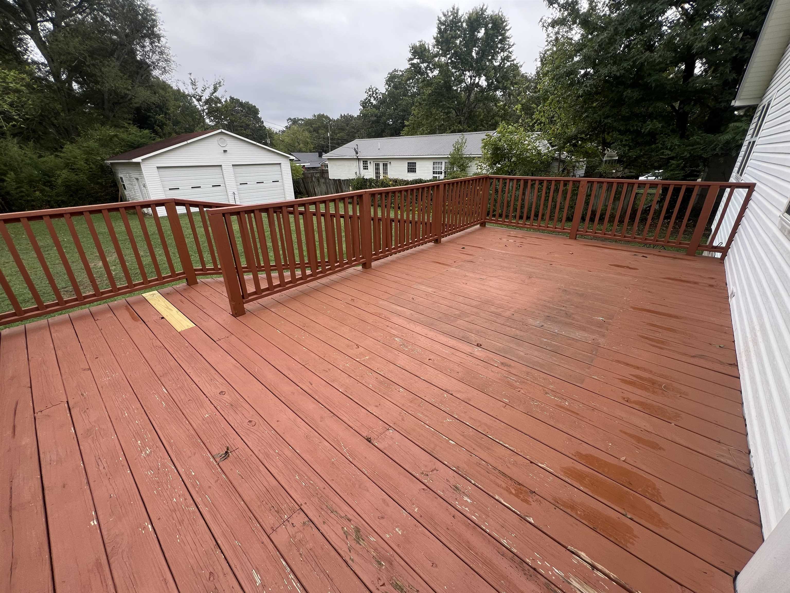 300 Patterson Road Savannah, TN 38372 - Photo 20 of 30 a view of balcony with wooden floor and fence