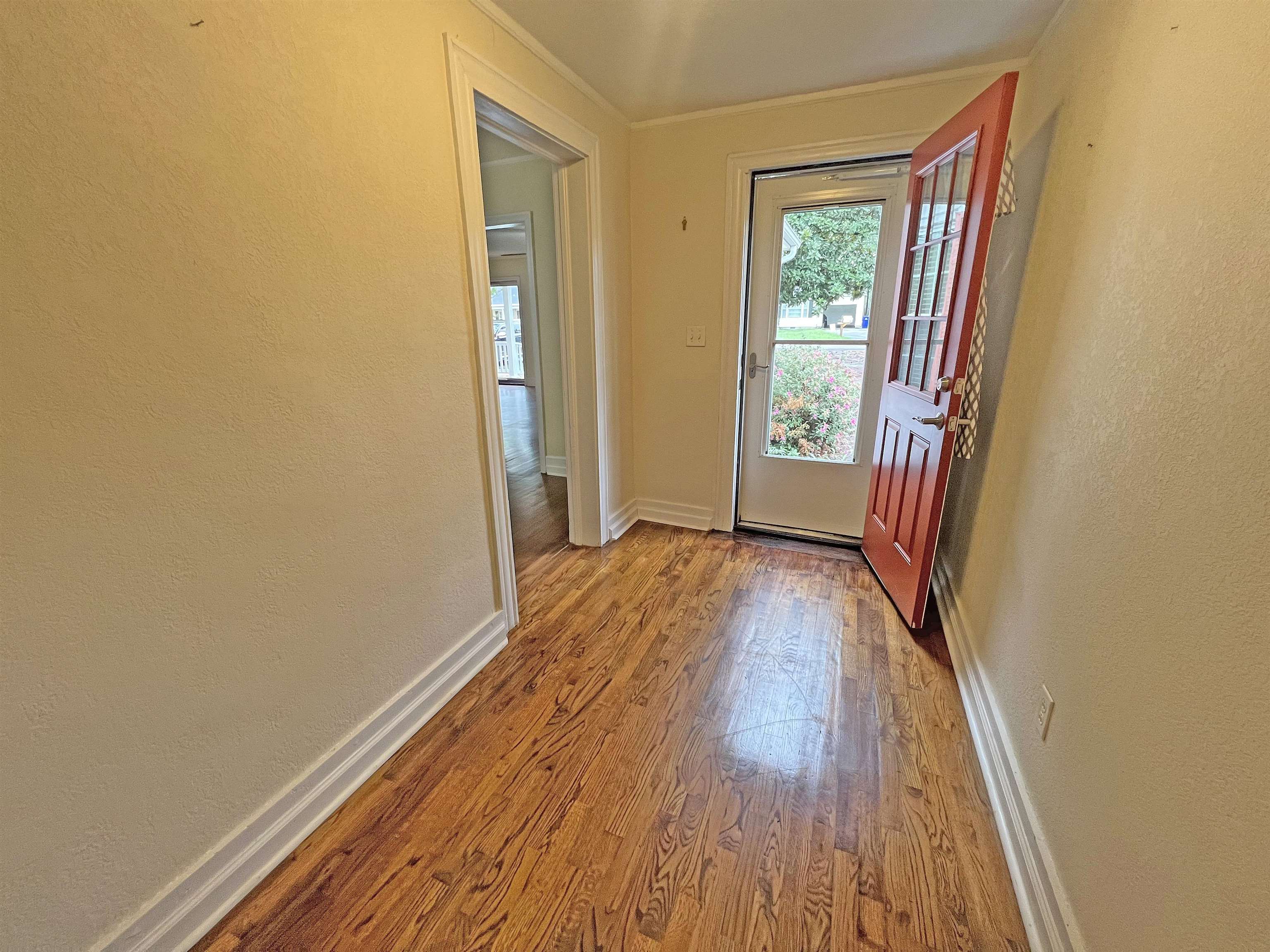 300 Patterson Road Savannah, TN 38372 - Photo 3 of 30 a view of a room with wooden floor and a window