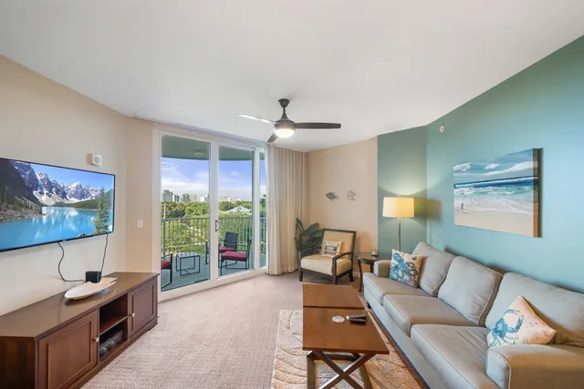 a balcony with an outdoor seating space