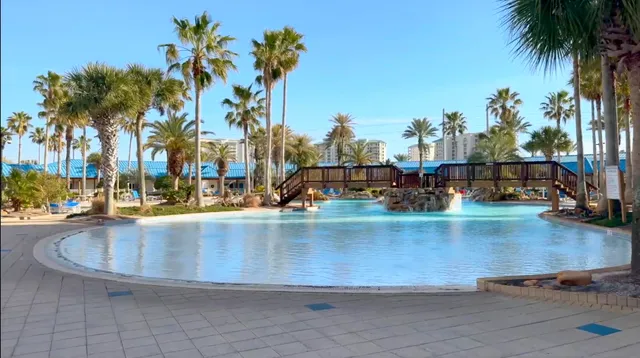 a living room with furniture a window and a dining table