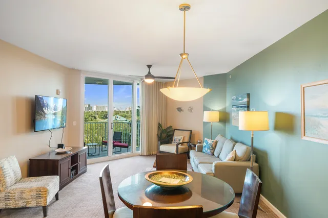 a living room with furniture and a table