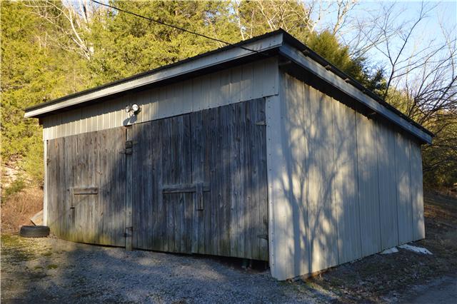 503 Rowland Hollow Road Liberty, TN 37095 - Photo 3 of 20 a wooden door in front of a house